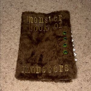 Furry Brown Monster Book Cover “Monster Book of Monsters”